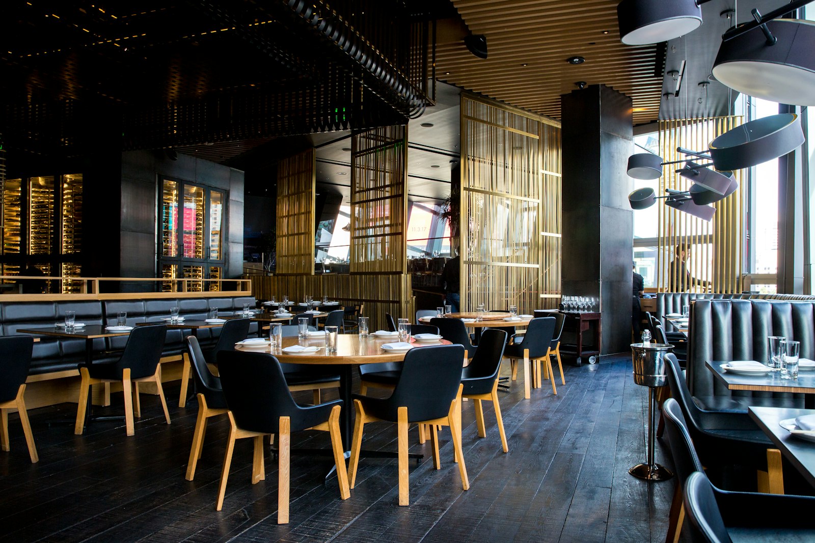 Modern chain restaurant dining hall full of guests